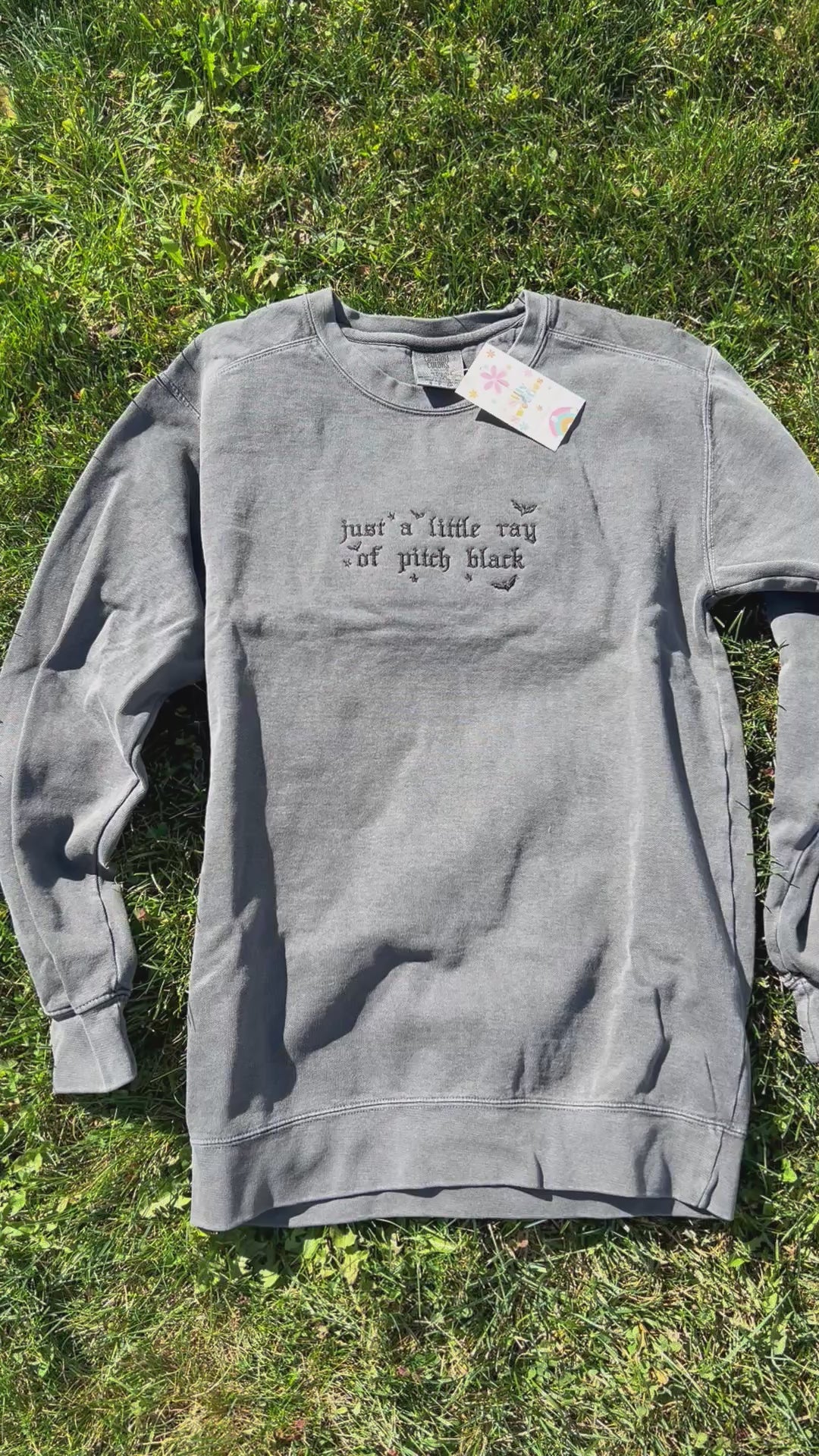 Just a Little Ray of Pitch Black Sweater Embroidered